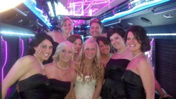 Happy customers enjoying luxury limousine service from freightmove.xyz in a memorable experience.